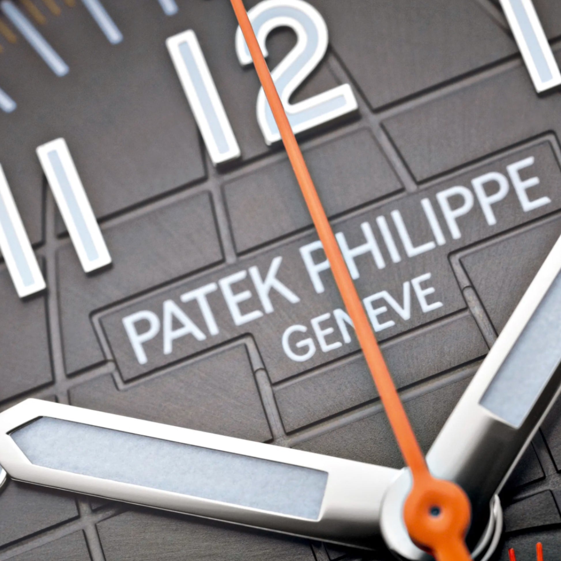 Patek Philippe Aquanaut 5968A-001 dial detail showing luminous hands, hour markers, and Swiss automatic movement precision