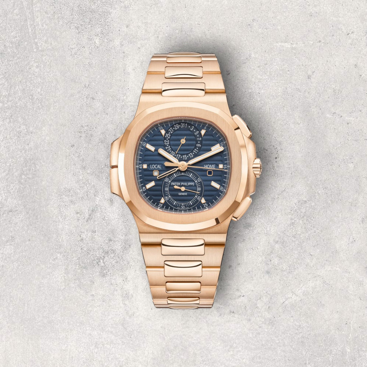 Patek Philippe Nautilus 5990/1R-001 Travel Time Chronograph in rose gold with blue dial