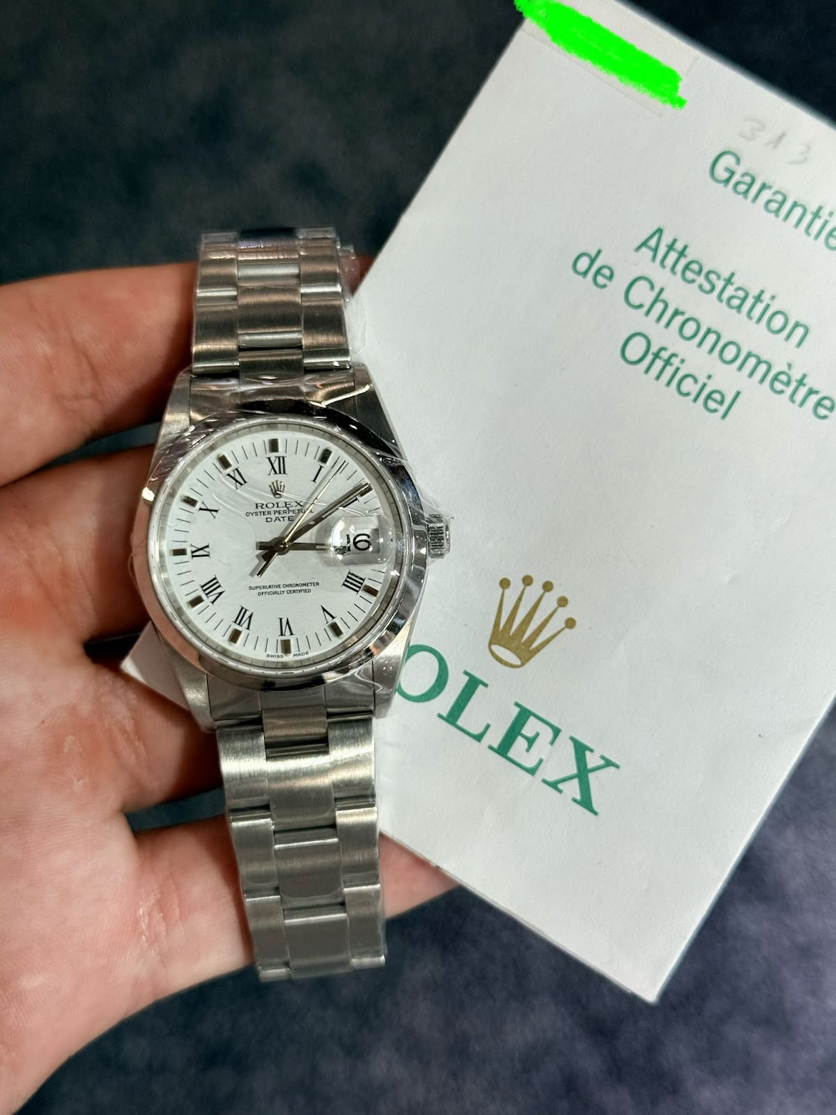 Rolex Date 15200 34mm Stainless Steel White Dial Oyster Bracelet Smooth Bezel