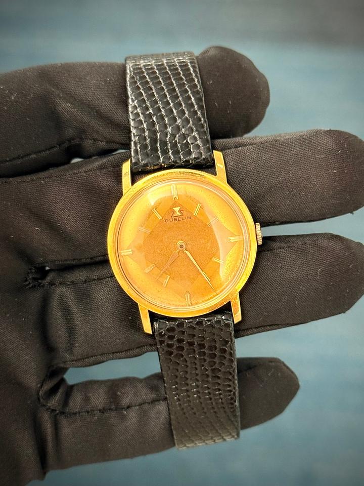 Gübelin Vintage 18K Yellow Gold Cal. 320 Champagne Dial — 1