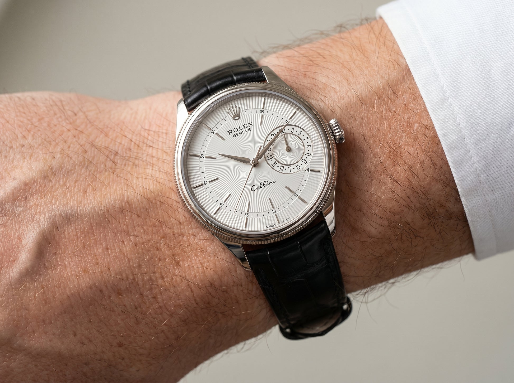 Rolex Cellini Date 39mm White Gold Silver Guilloche Dial Black Leather — lifestyle wrist close-up