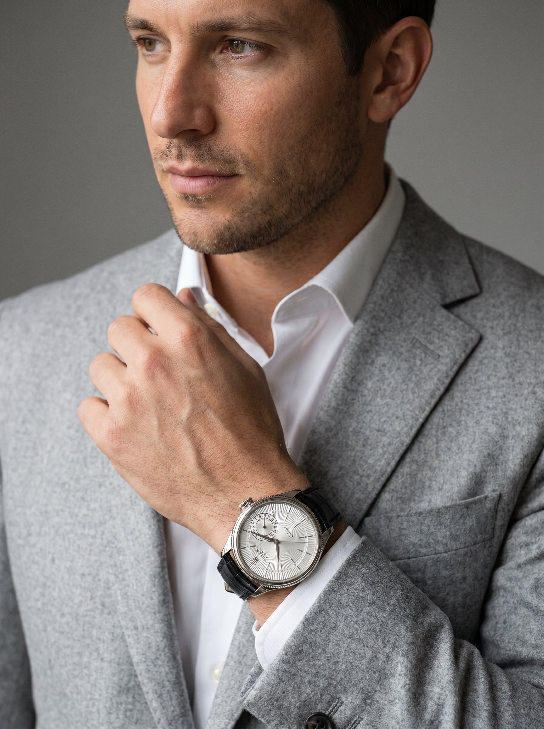 Rolex Cellini Date 39mm White Gold Silver Guilloche Dial Black Leather — lifestyle editorial medium shot