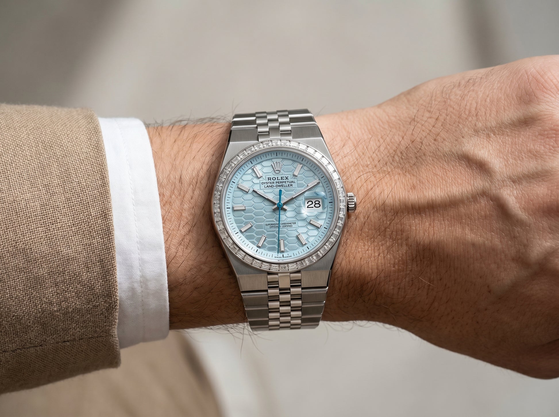 Rolex Land-Dweller 36 Ice Blue Dial 36mm Platinum — lifestyle wrist close-up