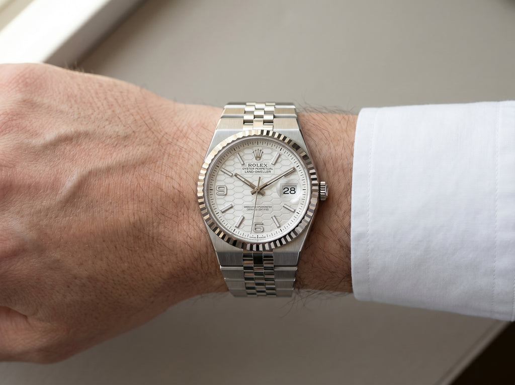 Rolex Land-Dweller 36 Steel/White Gold Honeycomb Dial 127234 — lifestyle wrist close-up