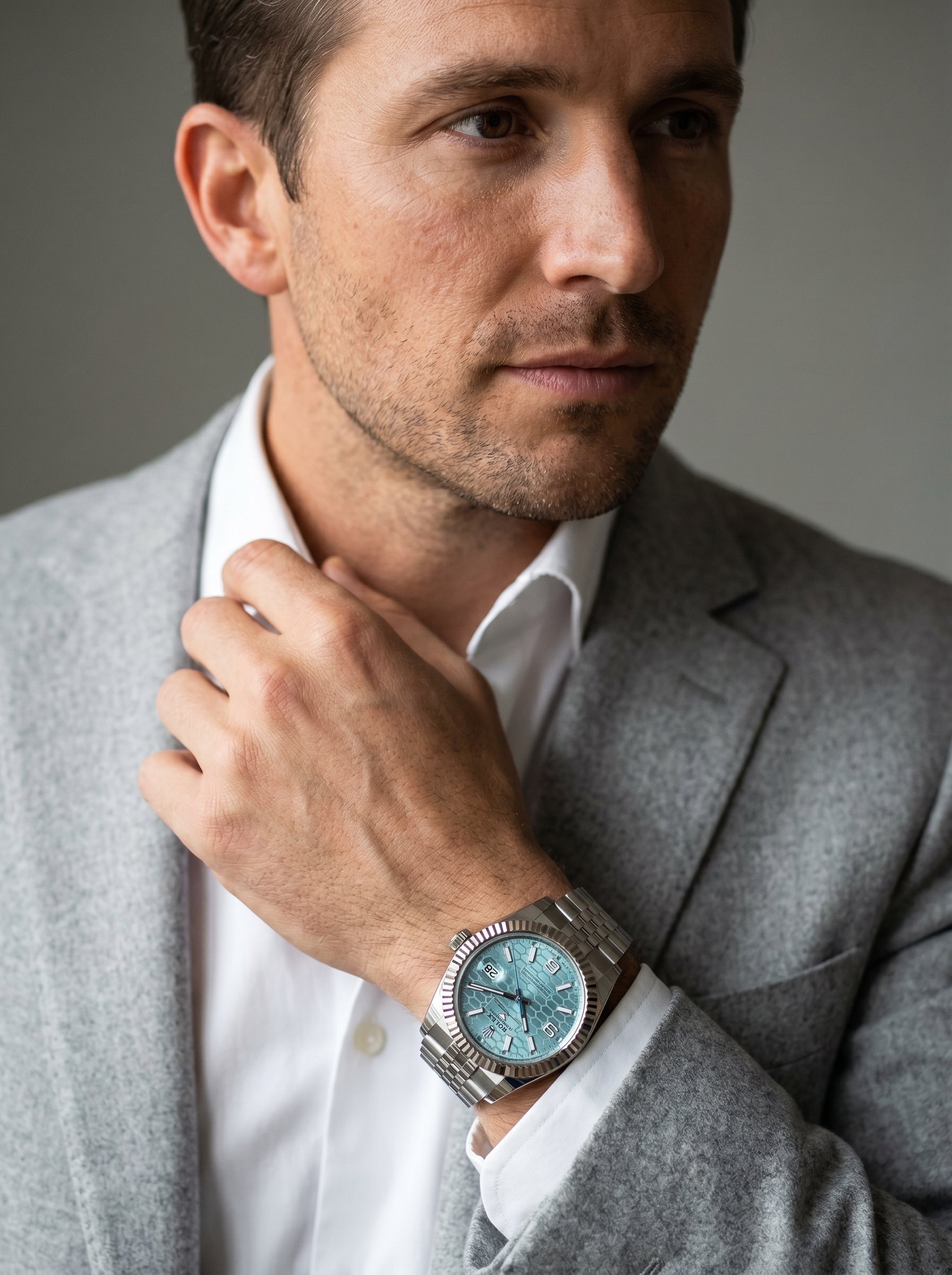 Rolex Land-Dweller 40 Platinum Ice Blue Honeycomb Dial 127336 — lifestyle editorial medium shot