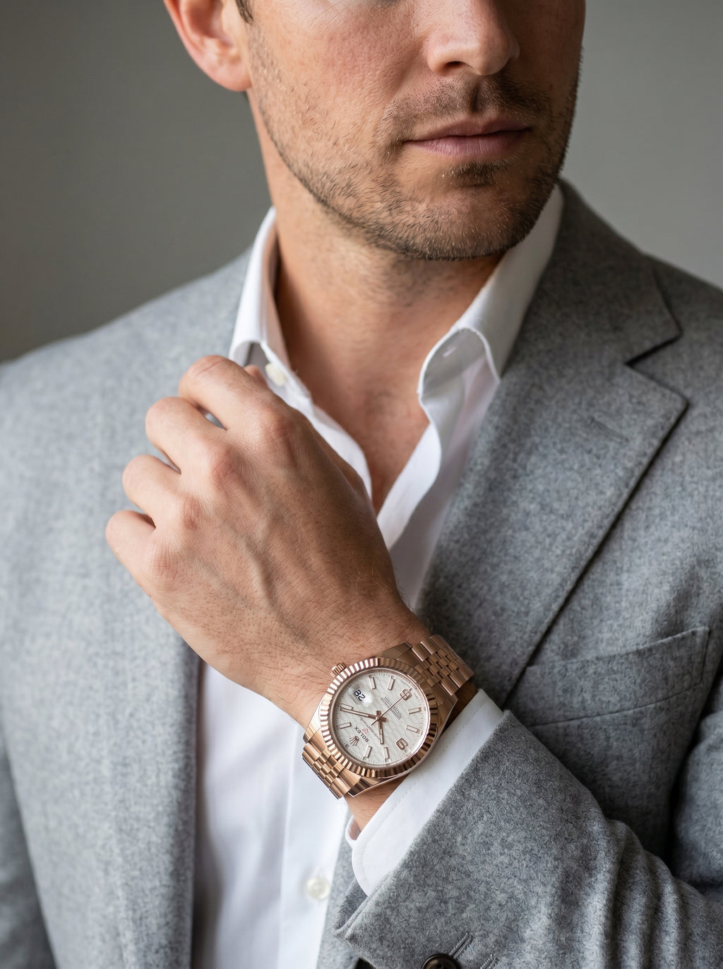 Rolex Land-Dweller 40 Rose Gold White Honeycomb Dial 127335 — lifestyle editorial medium shot
