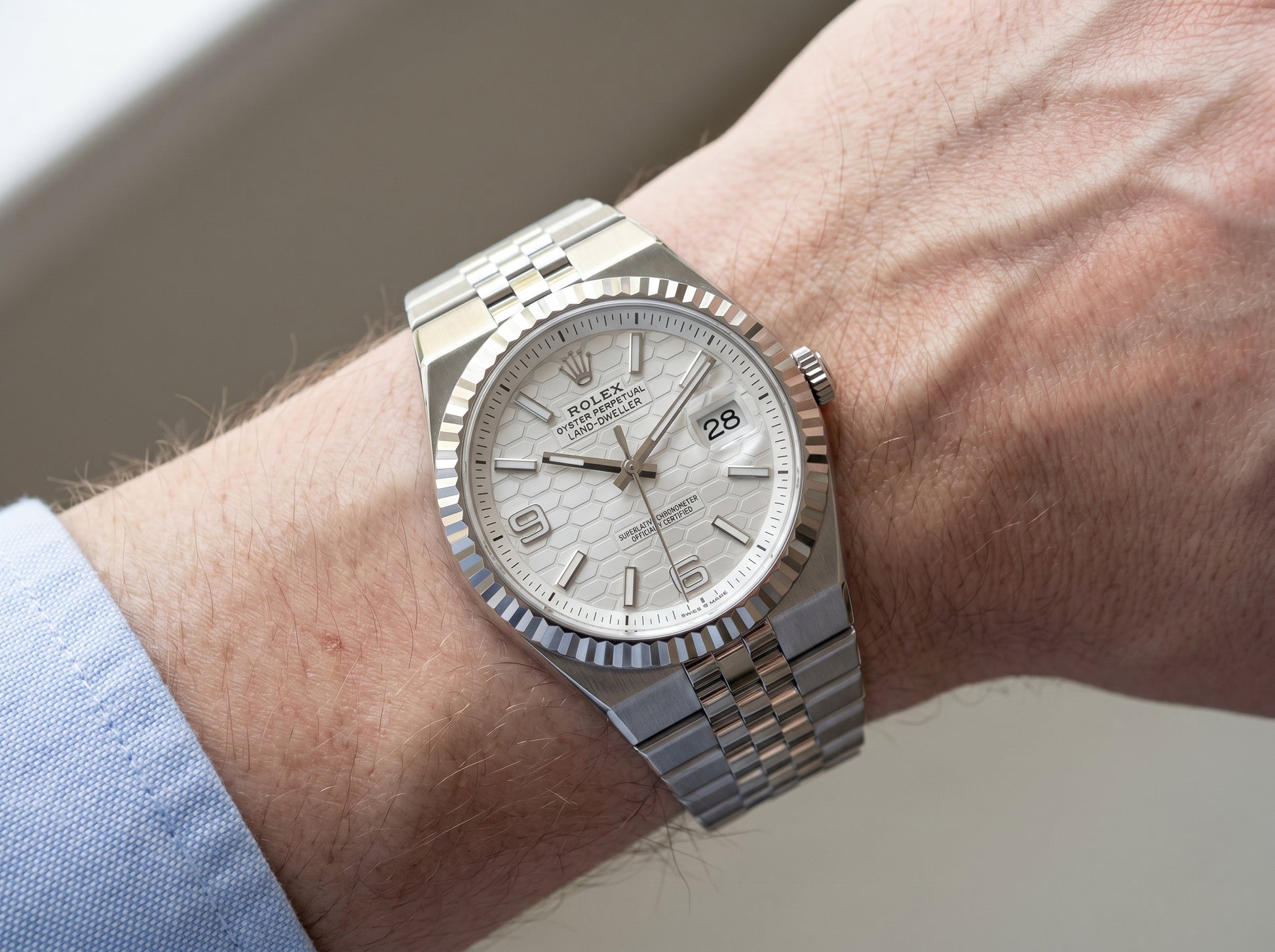 Rolex Land-Dweller 40 White Gold Steel Intense White Dial 127334 — lifestyle wrist close-up